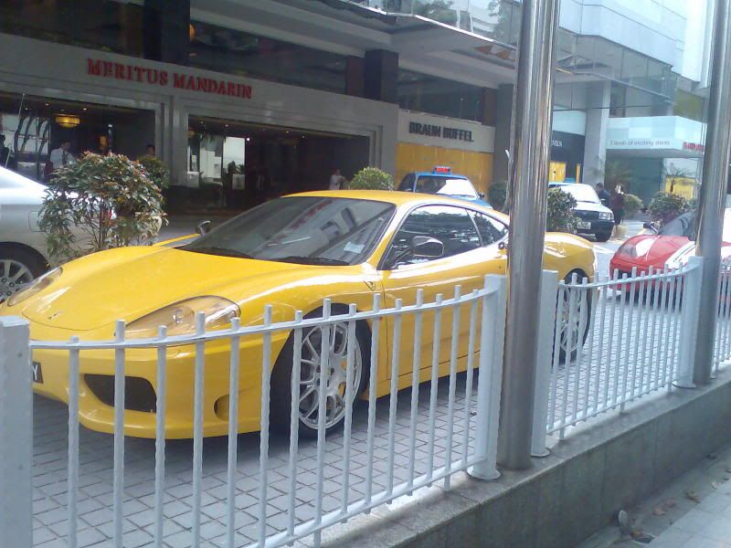 TAKA; yellow ferrari