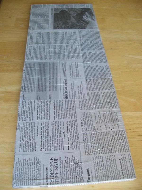 Homemade chalkboard craft with newspapers