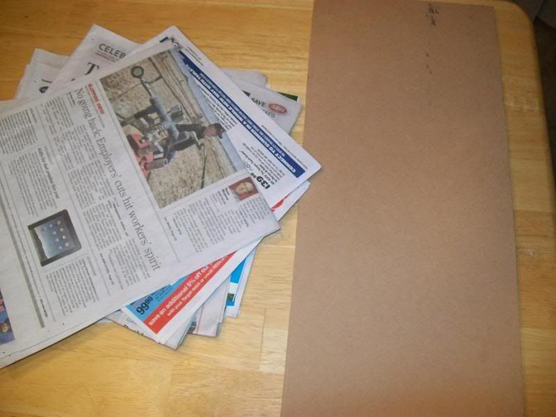 Homemade chalkboard craft with newspapers