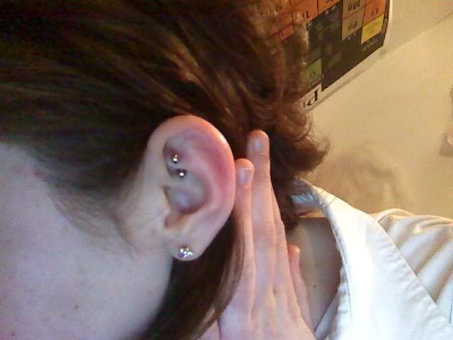 I'm a cool, pierced geek 8D) Apparently it gets infected quite easily, 